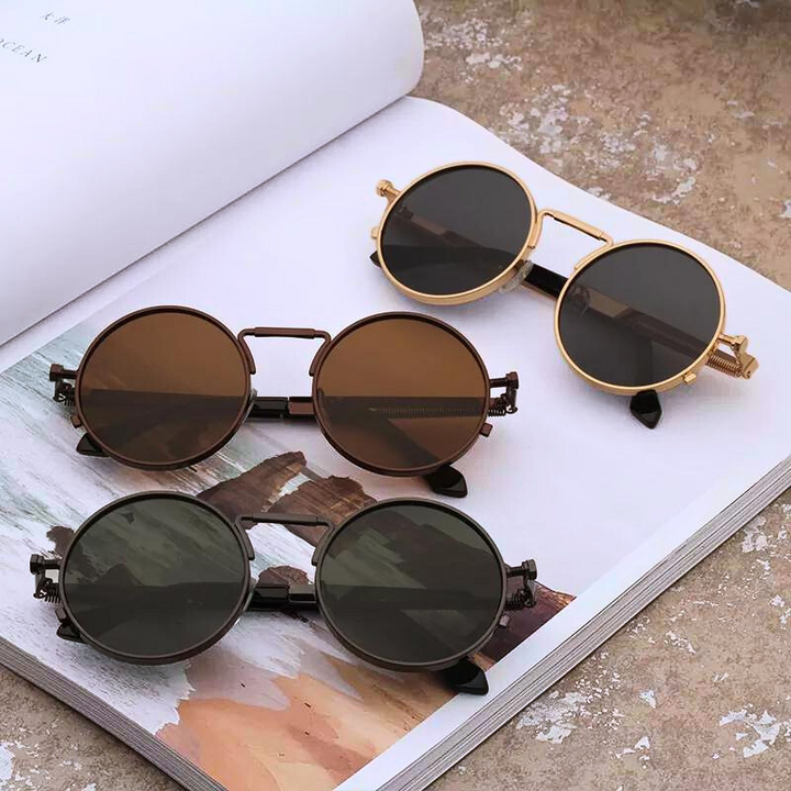 Unisex retro style sunglasses, black frames with UV protection lenses, a classic fashion accessory.