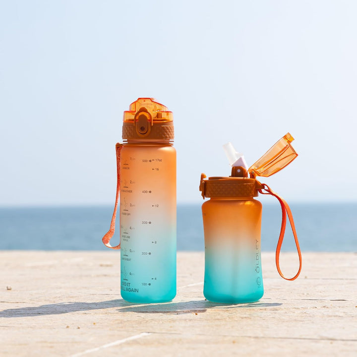 Convenient reusable Tritan water bottle, with straw and chug lids, perfect for grab-and-go hydration.