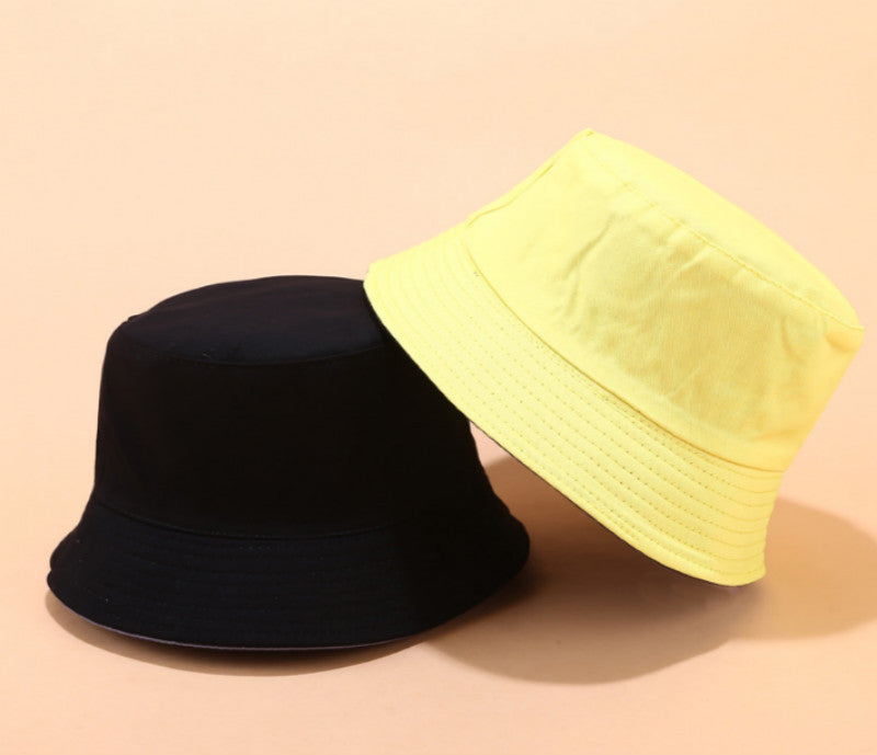 Trendy ReversiShade unisex bucket hat, reversible design for versatile summer fashion accessory