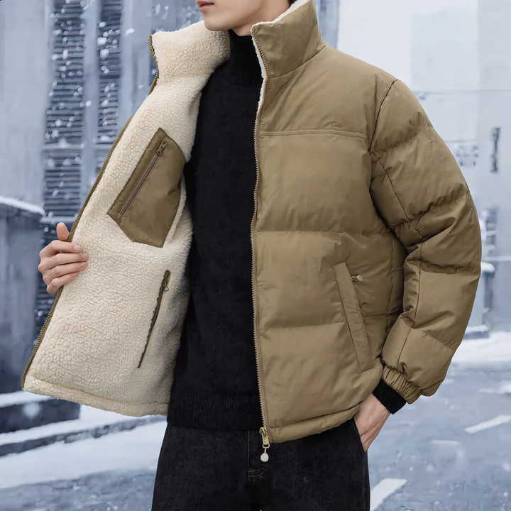 Warm unisex reversible winter jacket for cold weather, featuring a cozy design and practical utility pockets.
