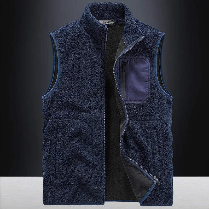Model wearing a warm unisex Ridge fleece vest. Stylish and cozy layering piece for casual everyday comfort.