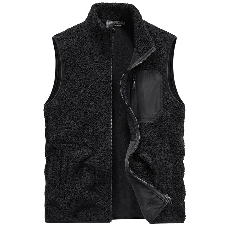 Warm unisex sherpa vest layered over a long-sleeve shirt. Essential cozy outerwear for cold weather and everyday use.