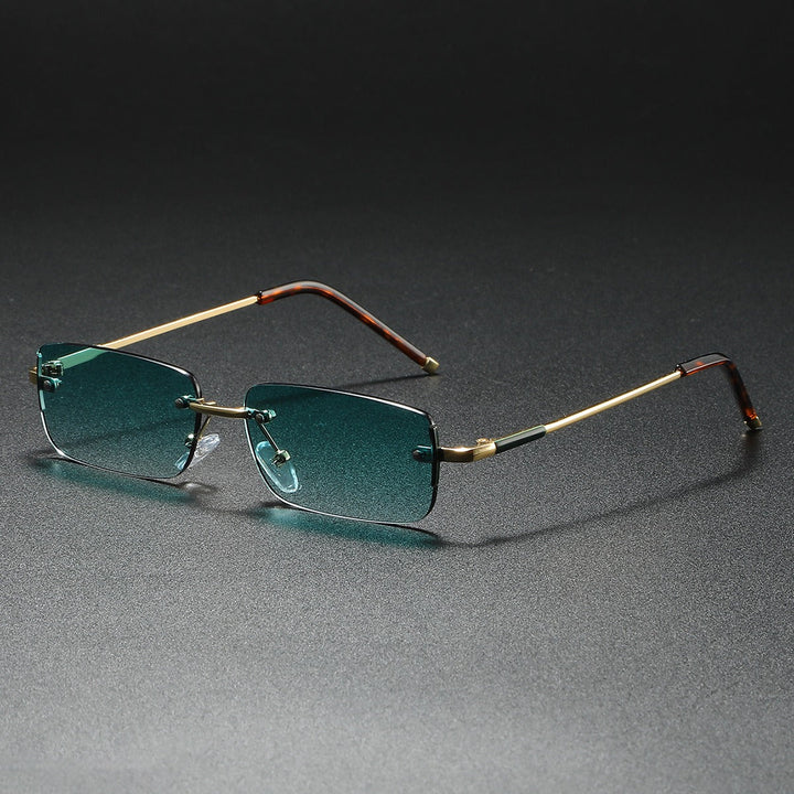 Luxury gold rimless rectangle sunglasses for unisex style, featuring chic gradient lenses and lightweight design.