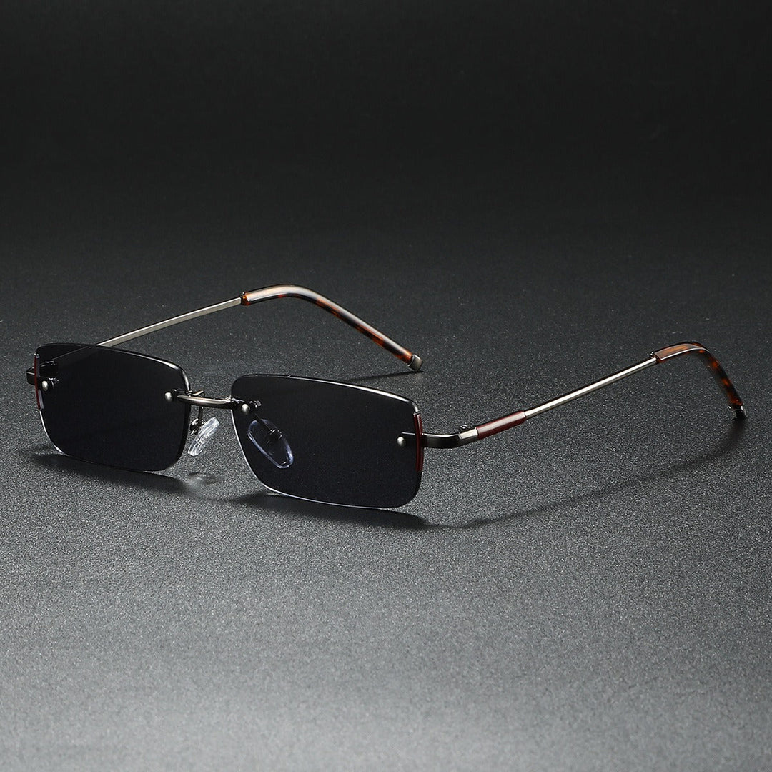 Elegant rimless rectangle sunglasses with gold accents and gradient lenses, a luxurious unisex eyewear choice.