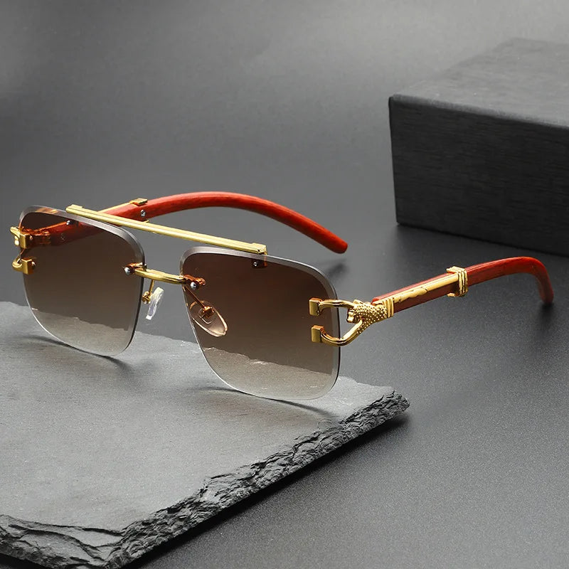 Lightweight dragon-engraved rimless sunglasses for men & women. Provides ultimate UV eye protection & style.