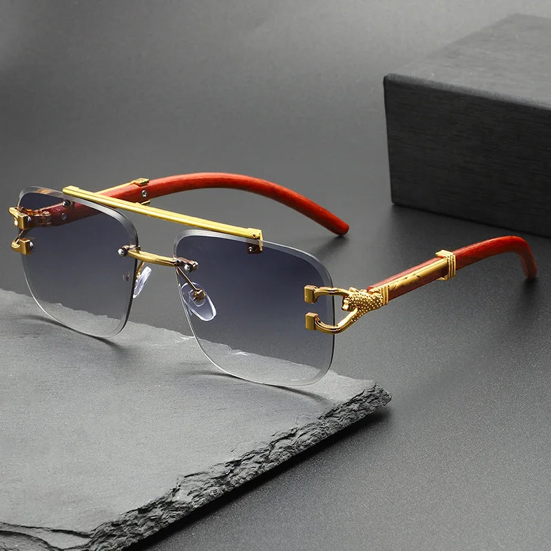 Sleek rimless dragon-engraved sunglasses. Unisex design with advanced UV protection for stylish eye comfort.