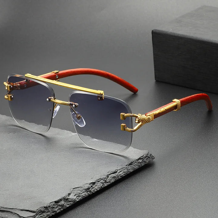 Sleek rimless dragon-engraved sunglasses. Unisex design with advanced UV protection for stylish eye comfort.