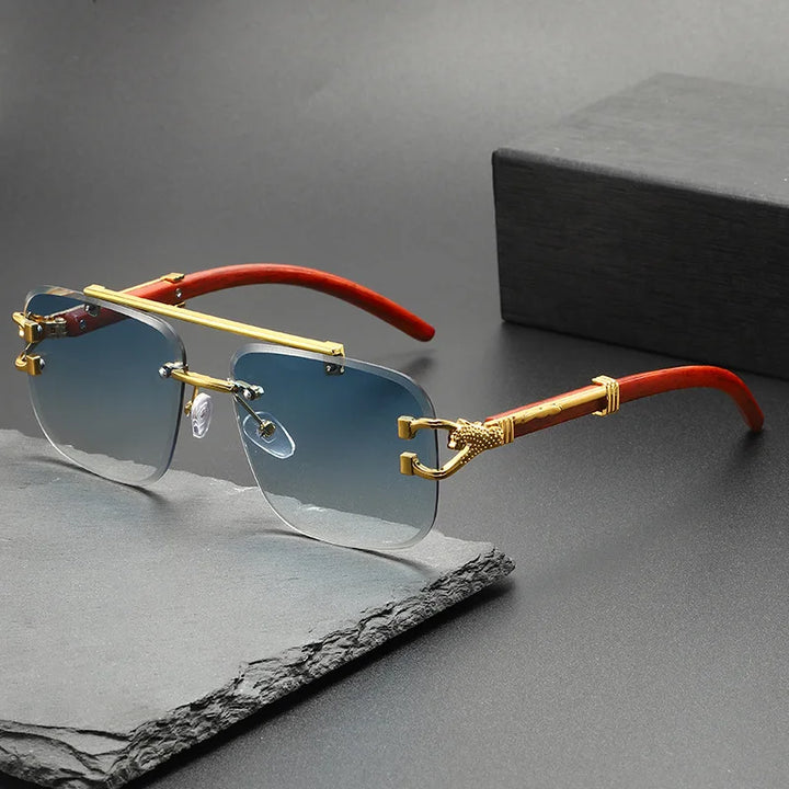 Dragon-engraved rimless UV protection sunglasses. Unisex fashion shades, lightweight for ultimate eye comfort.