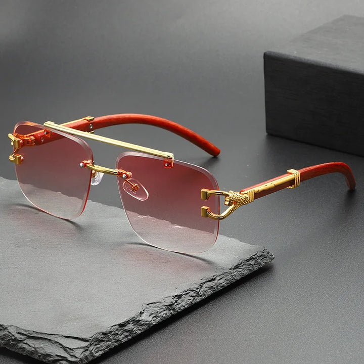 Unisex rimless sunglasses, uniquely dragon-engraved. Fashionable eyewear with superior UV protection for all.
