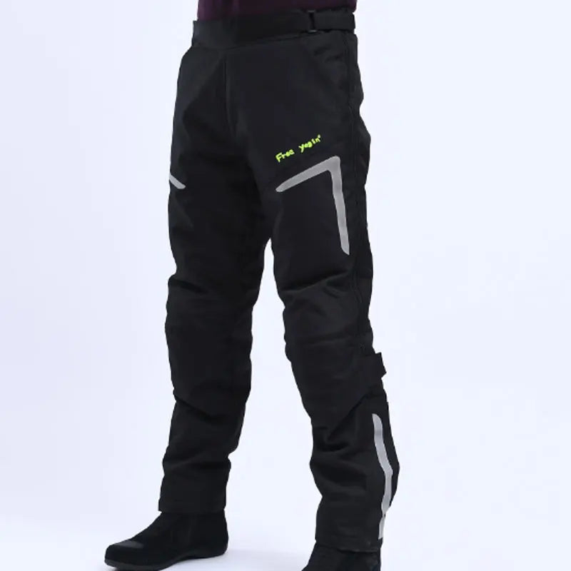 Stack of black RoadGuard armored, windproof motorcycle pants - essential unisex riding gear