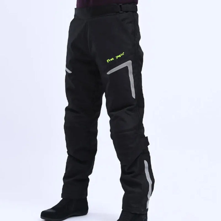Stack of black RoadGuard armored, windproof motorcycle pants - essential unisex riding gear