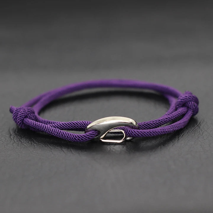 Rugged rope bracelet, adjustable fit, secure hook clasp, ideal unisex active wear.