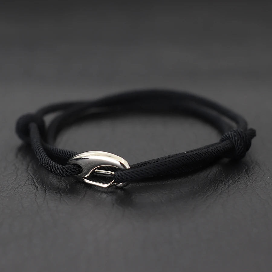 Rugged unisex rope bracelet, adjustable design, durable for daily wear, features a secure hook clasp.
