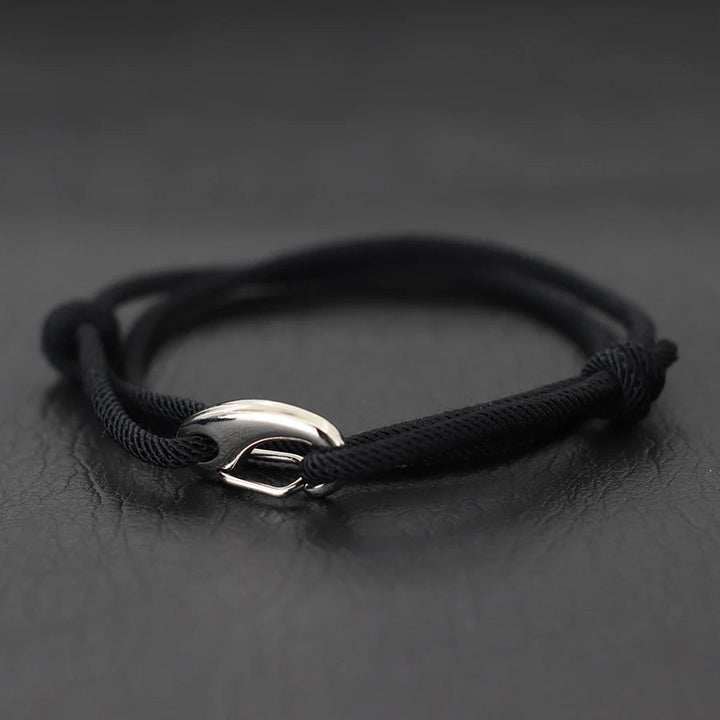 Rugged unisex rope bracelet, adjustable design, durable for daily wear, features a secure hook clasp.
