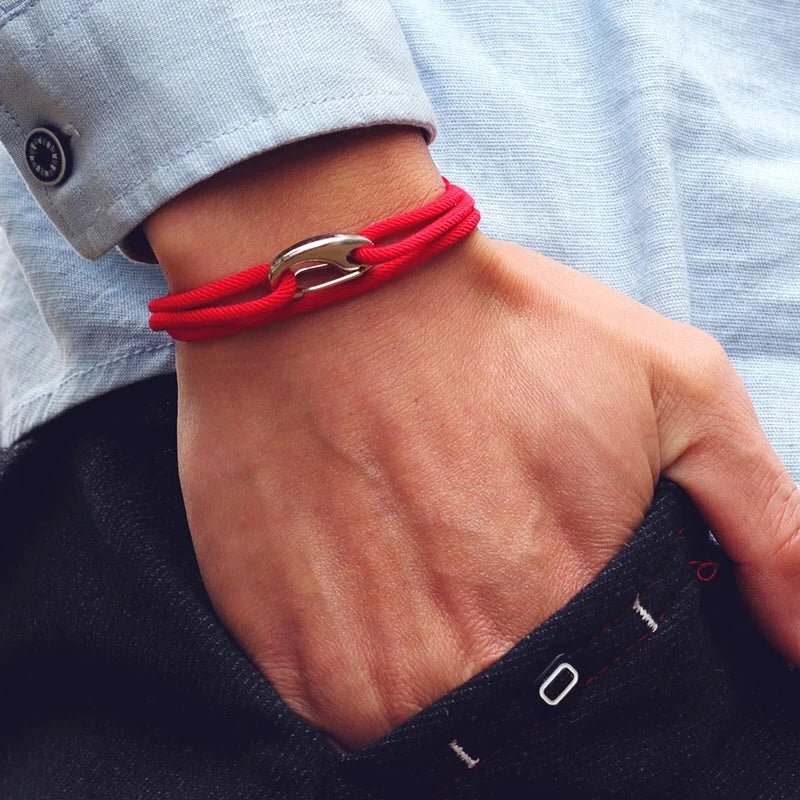 Secure hook clasp on a rugged, adjustable rope bracelet for unisex, durable everyday jewelry.