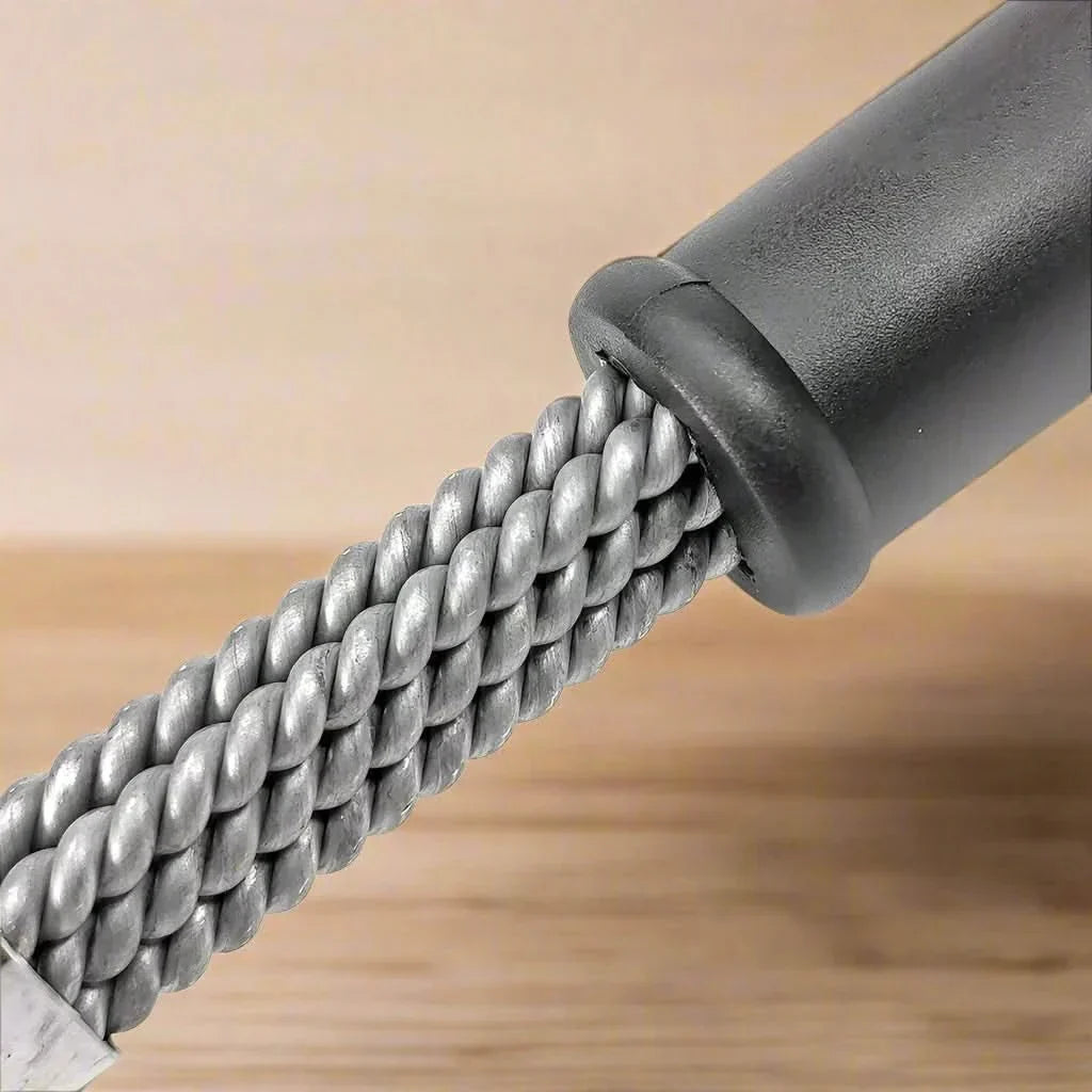 High-quality bristle-free stainless steel grill brush, ensuring safe and thorough cleaning of BBQ grates.