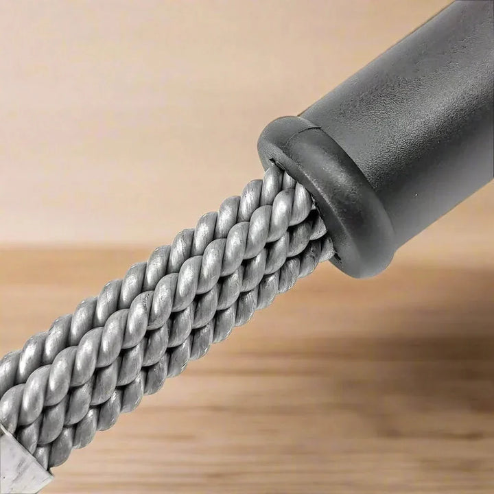 High-quality bristle-free stainless steel grill brush, ensuring safe and thorough cleaning of BBQ grates.