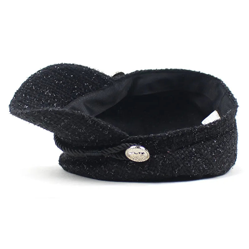 Close-up of a textured Savanna cotton cap, highlighting its vintage flair and woven design. Casual headwear.