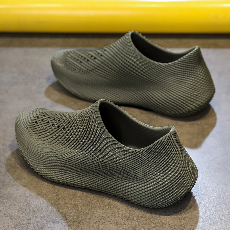 Grip-enhanced all-terrain running shoes, lightweight and water resistant.