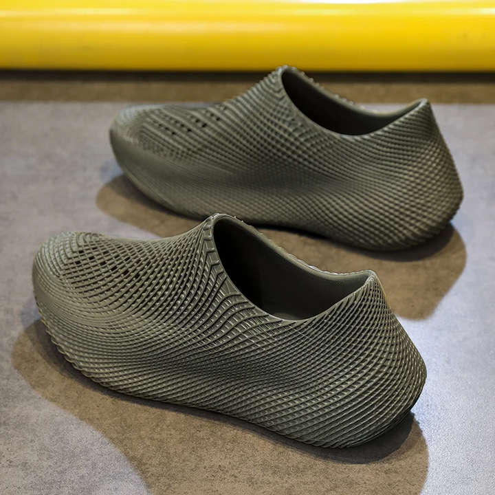 Grip-enhanced all-terrain running shoes, lightweight and water resistant.