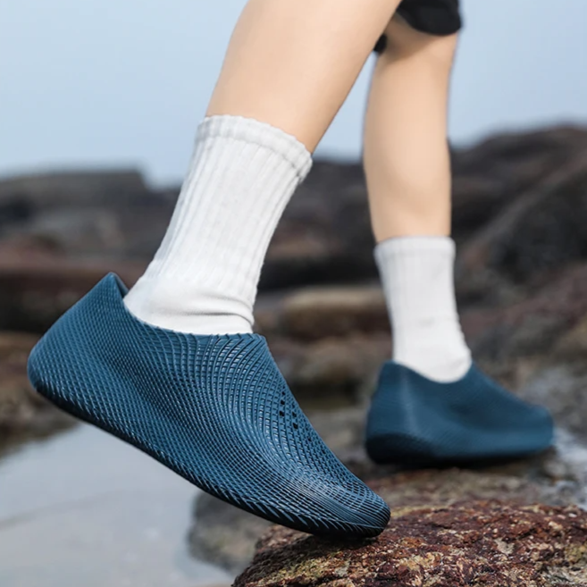 Unisex outdoor running shoes, water resistant with an an athletic, lightweight feel.