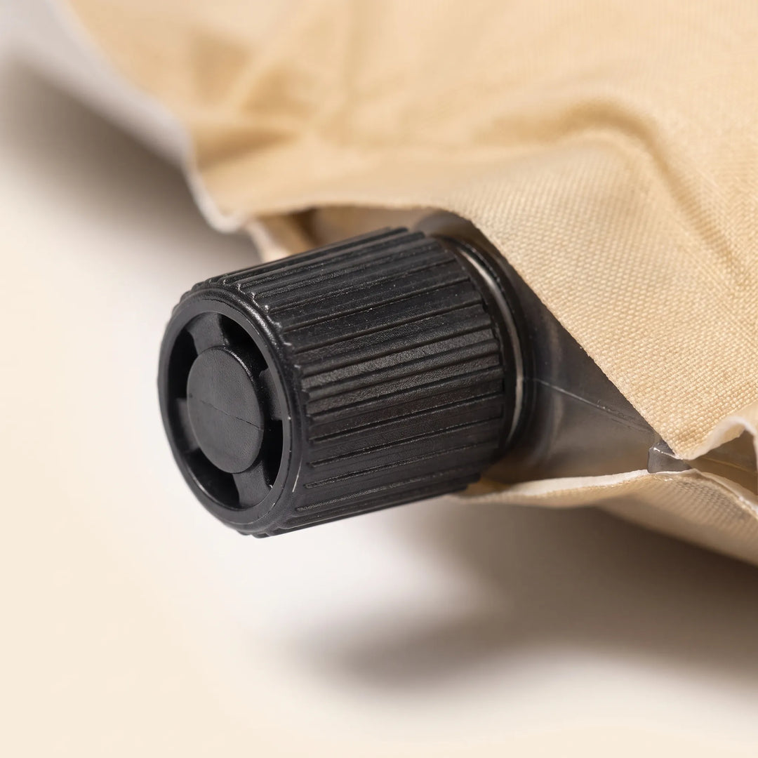 Durable self-inflating camping sleeping pad for backpacking adventures. Comfortable outdoor mattress for hikers.