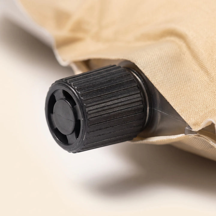 Durable self-inflating camping sleeping pad for backpacking adventures. Comfortable outdoor mattress for hikers.