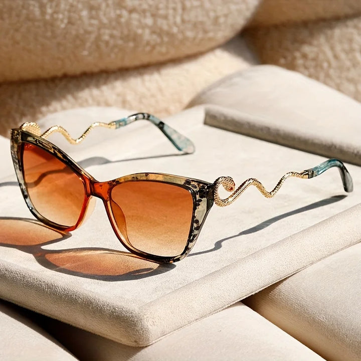 Unisex Serpentina fashion sunglasses with bold frames and UV protection for trendsetters.