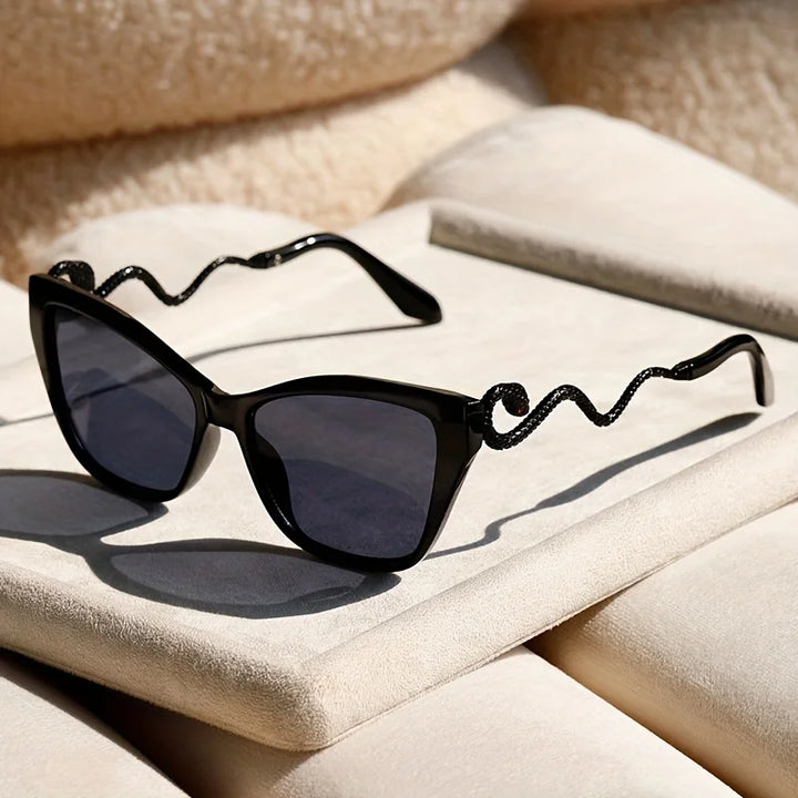 Bold Serpentina fashion sunglasses providing essential UV protection. Stylish unisex eyewear accessory.