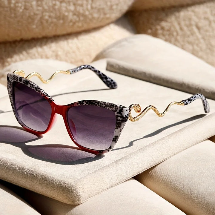 Distinctive Serpentina frame fashion sunglasses, offering unique bold style and UV protection. Unisex accessory.