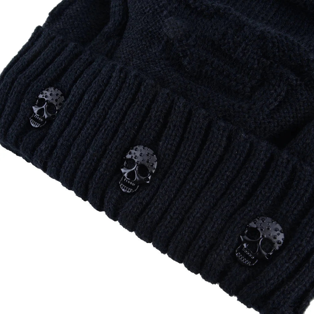 Warm knit shadow skull cap with stylish metallic skull details. Ideal cold weather fashion accessory.