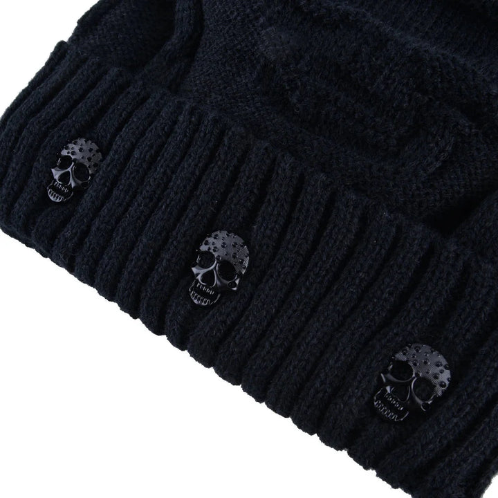 Warm knit shadow skull cap with stylish metallic skull details. Ideal cold weather fashion accessory.