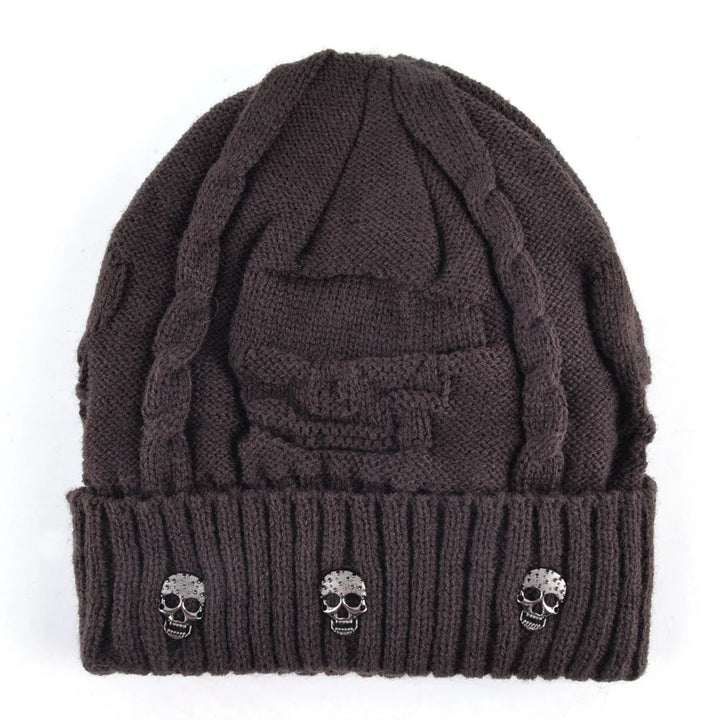 Comfortable knit skull cap in shadow black, featuring eye-catching metallic skulls. Unisex design.