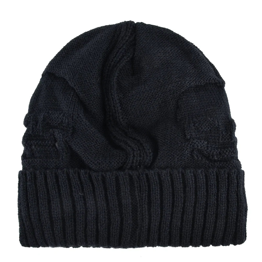 Shadow skull cap with a stretch fit and distinctive metallic skull accents. Perfect beanie for all.