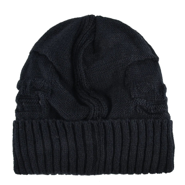 Shadow skull cap with a stretch fit and distinctive metallic skull accents. Perfect beanie for all.