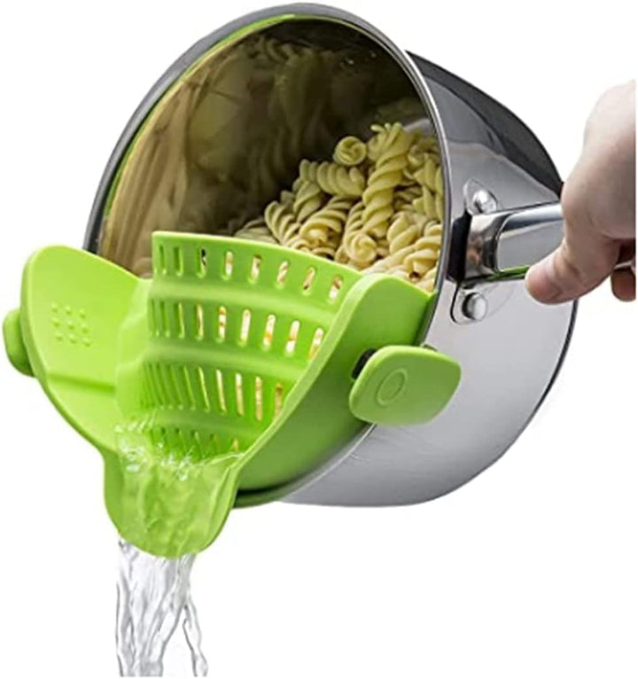 Kitchen tool: green silicone clip-on strainer, compact and ready to use for pasta