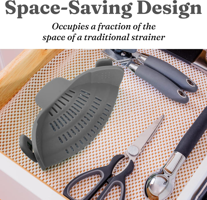 Unisex silicone clip-on strainer in red, draining cooked vegetables from a pot