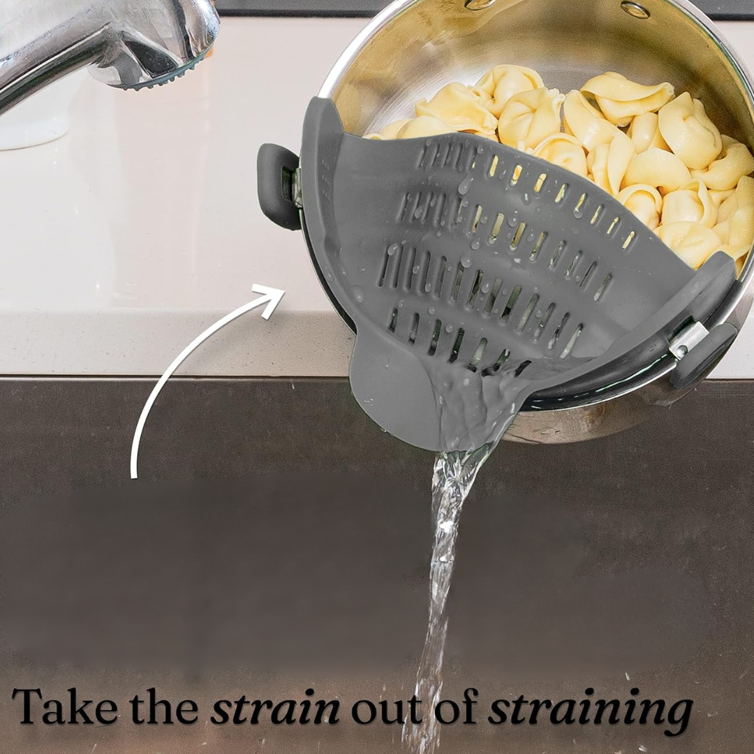 Easy drain kitchen gadget: purple silicone clip-on strainer on a stainless steel pot
