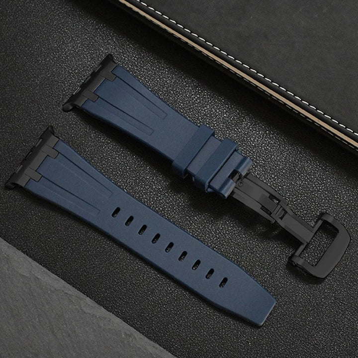 Contemporary unisex silicone smartwatch band designed for comfort, secured by a sleek titanium buckle.
