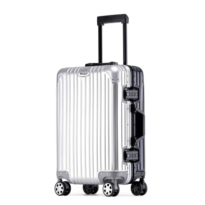 Ergonomic telescoping handle on a lightweight aluminum carry-on, perfect for easy airport maneuverability.