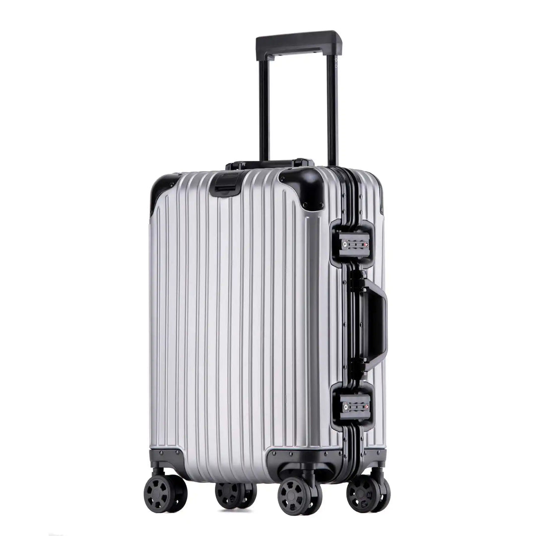 Stylish unisex aluminum hard shell luggage glides through airport, a reliable & secure travel companion.