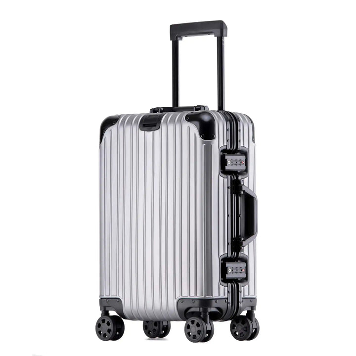 Stylish unisex aluminum hard shell luggage glides through airport, a reliable & secure travel companion.