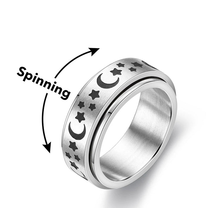 Hand modeling a sleek unisex silver fidget ring, promoting calm & discreet anxiety relief. Fashion jewelry.