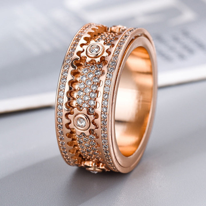 Close-up of a silver spinner ring, a discreet unisex fidget tool for stress & anxiety relief.