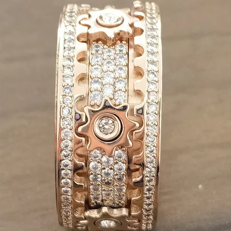 Chic rose gold stress relief ring, a unisex spinner for managing anxiety and adding style.