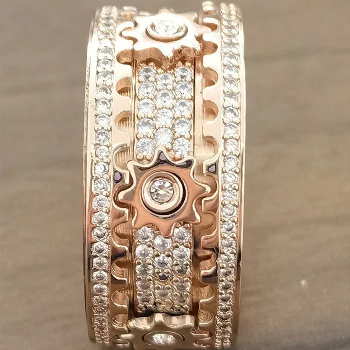 Chic rose gold stress relief ring, a unisex spinner for managing anxiety and adding style.