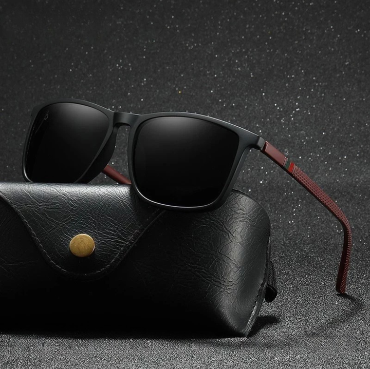 Unisex slate polarized sunglasses, offering superior glare and UV protection for outdoor activities.
