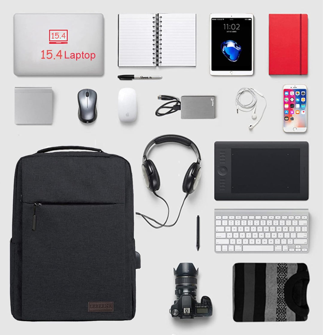 Unisex slim laptop backpack on a business trip, positioned next to a laptop and coffee, showcasing versatility for professionals