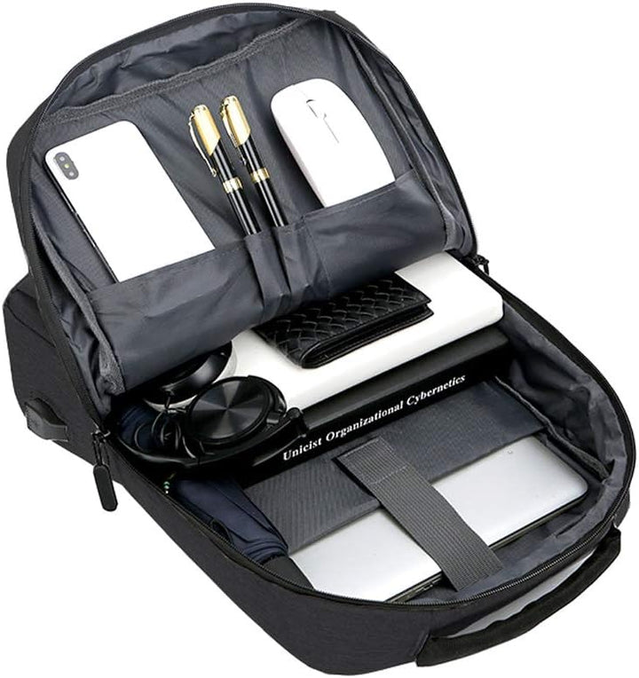 Close-up of the USB charging port on a black waterproof laptop backpack, highlighting convenience for travelers