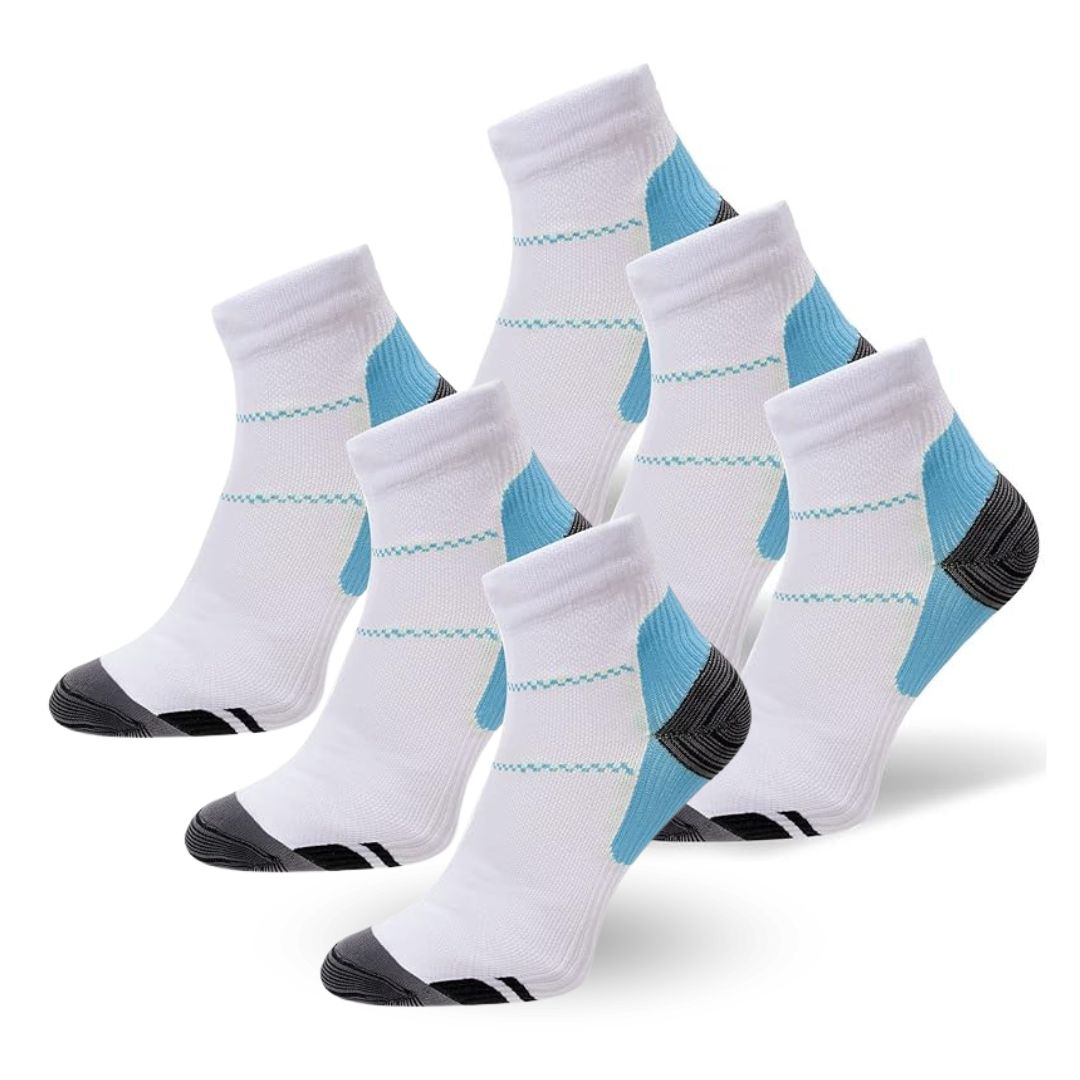 Person wearing black SlimSupport PRO 2.0 compression socks for foot pain relief & improved circulation.